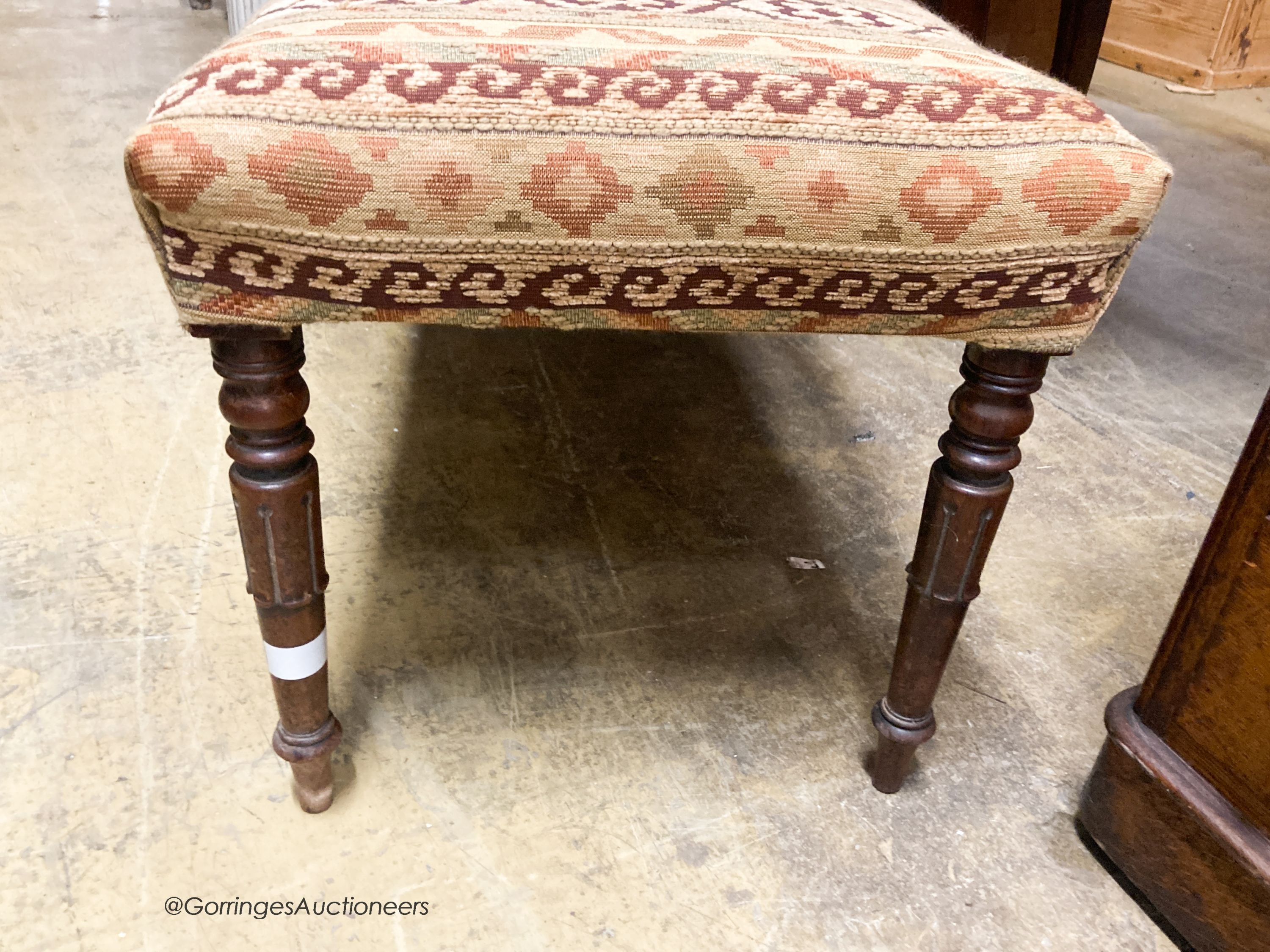 A William IV mahogany window seat, with kelim upholstery, W.104cm D.48cm H.48cm